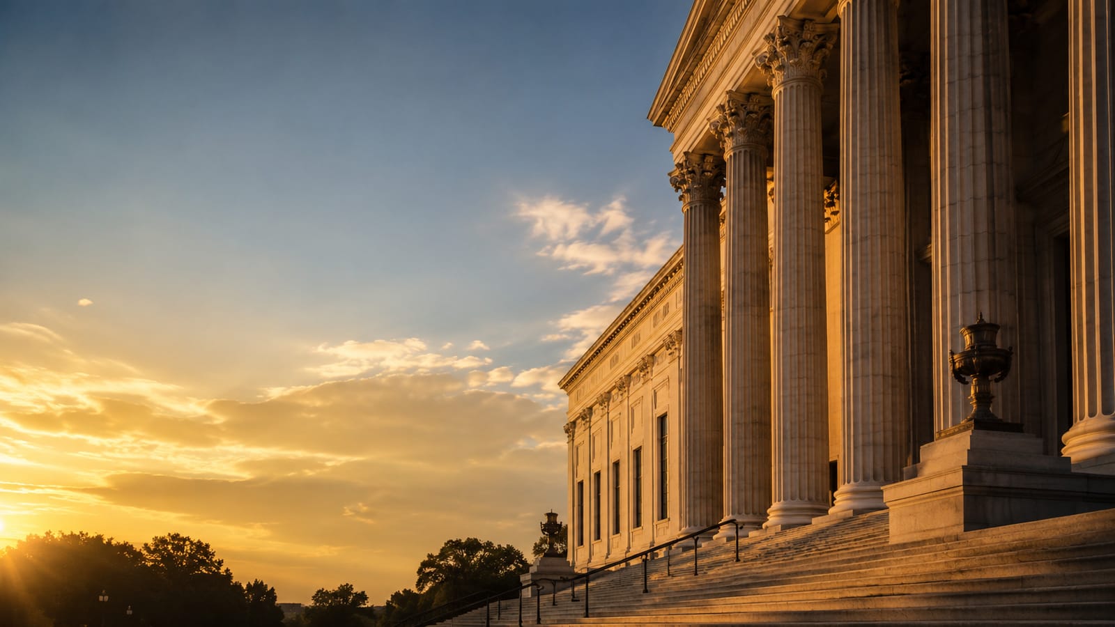 A federal courthouse at golden hour, symbolizing the court order to reinstate the AFGE–VA Master Agreement.